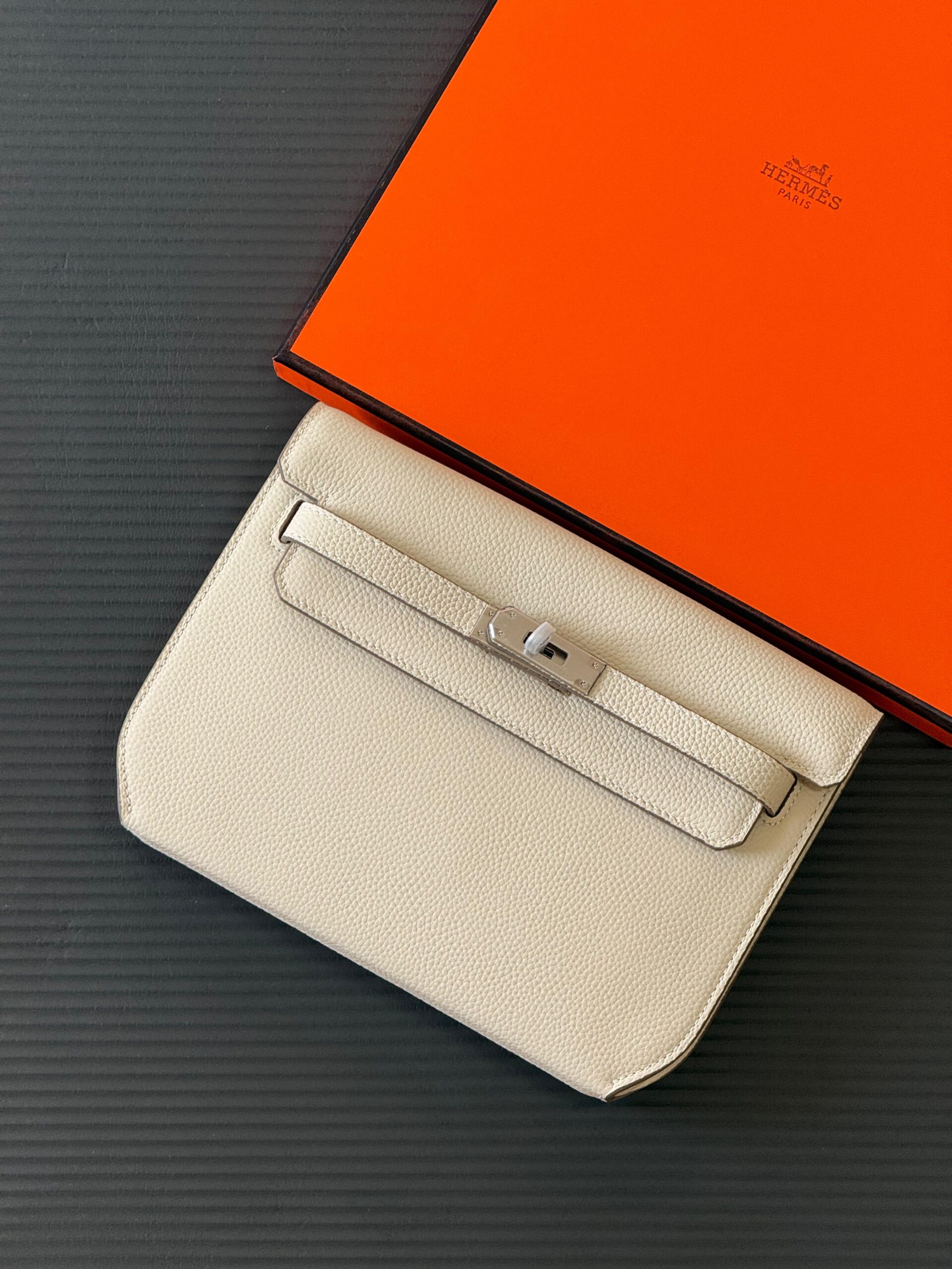 Ivory Elegance Lock Clutch